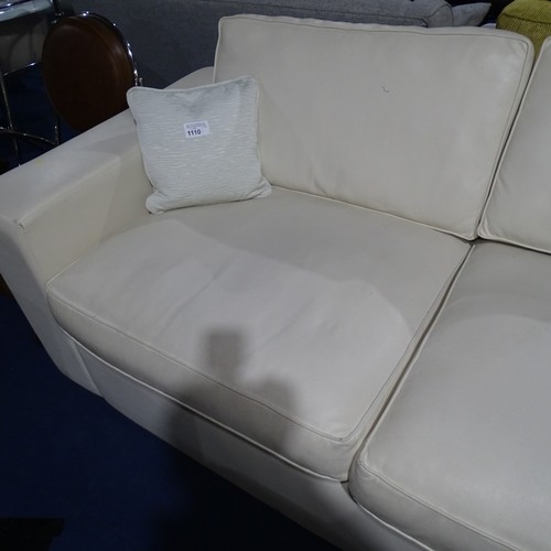 1110 - 1 x 3 Seater cream leather effect sofa approx 216cm wide