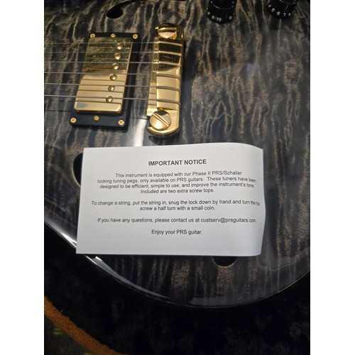 3 - 1 x PRS McCarty 594 Hollowbody II electric guitar in a burnt charcoal finish. SN: S97406 This guitar... 