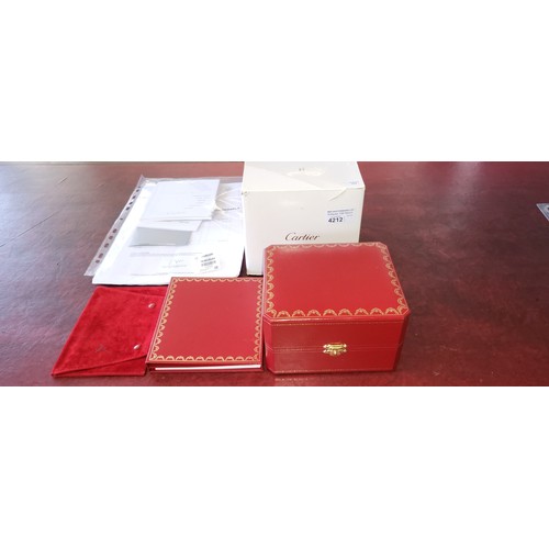 4212 - A Cartier Tank Solo small model gold & steel cased watch with quartz movement & leather stra... 