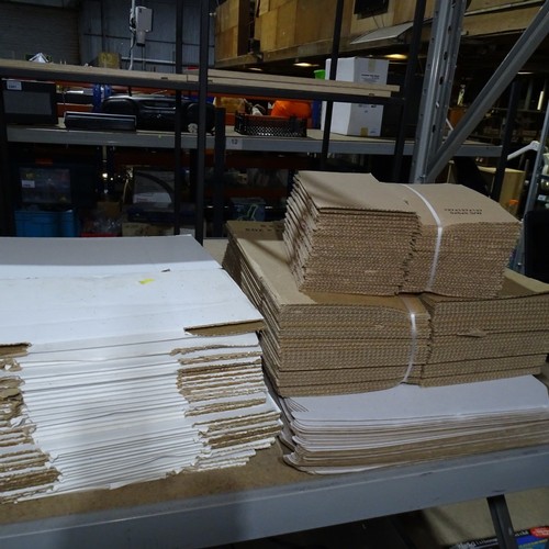 A quantity of various P&P flat pack packaging boxes