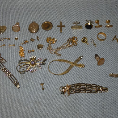 4215 - A collection of miscellaneous yellow metal costume jewellery and trinkets