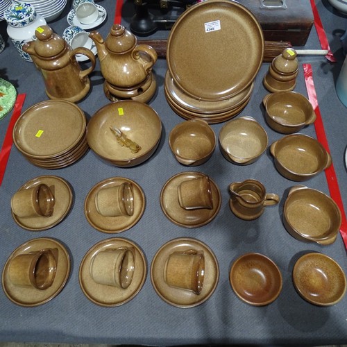 A quantity of plain brown stoneware pottery breakfast ware