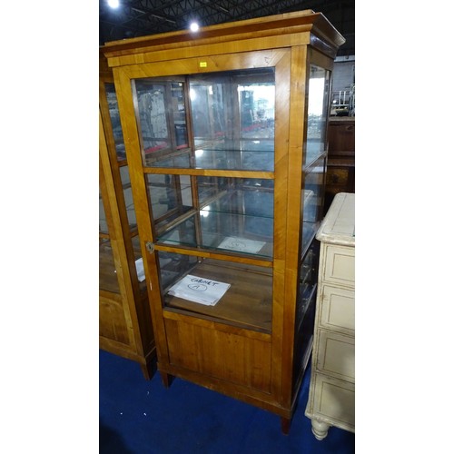 4482 - A pair of antique walnut Biedermeier style vitrine display cabinets, each with a glass door enclosin... 