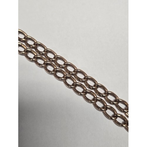 4210 - A 9 carat yellow gold Albert T bar chain and agate fob pendant, approximately 38cms long, weight app... 