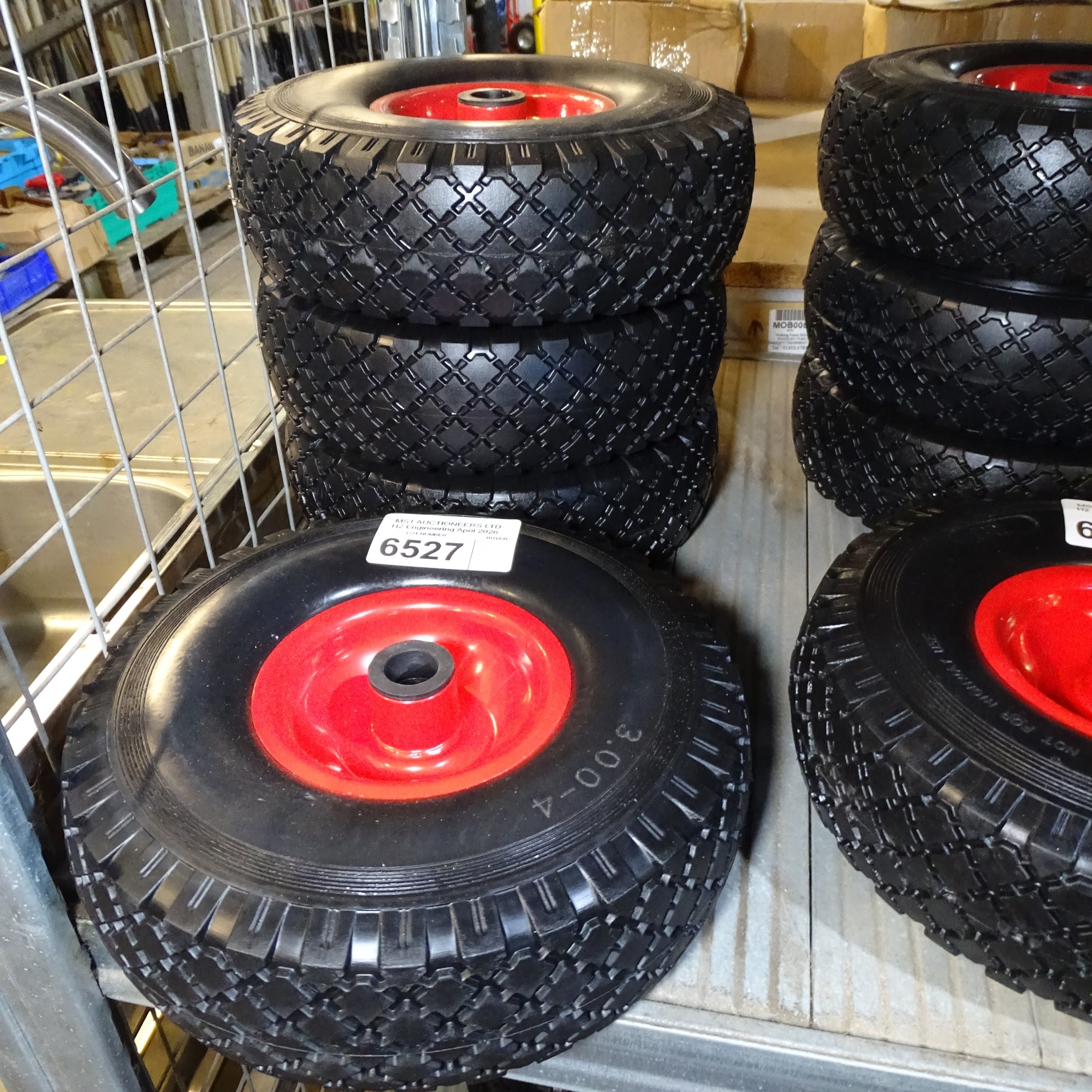 4 x small red metal wheels fitted with BIL 3.00-4 puncture resistant tyres