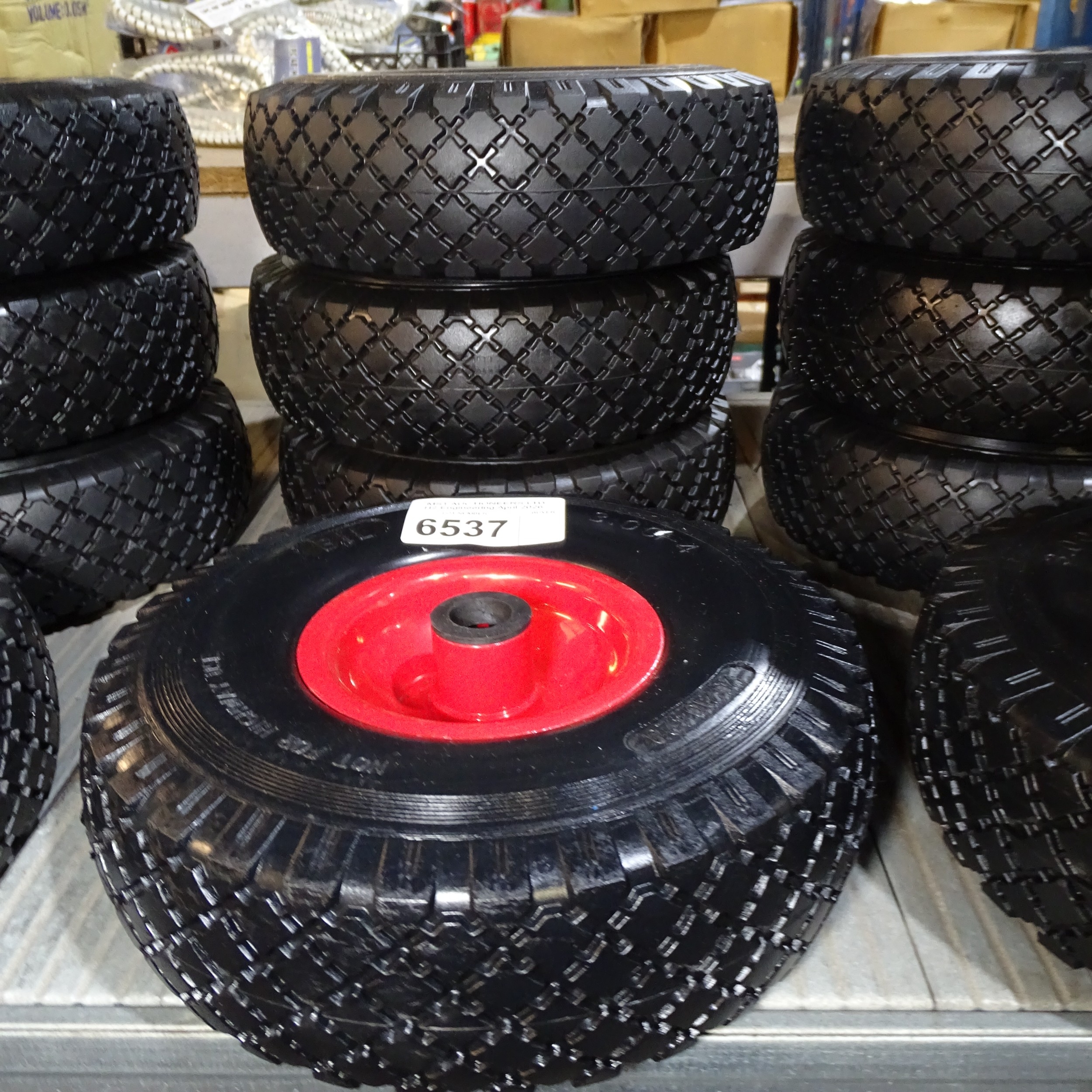 4 x small red metal wheels fitted with BIL 3.00-4 puncture resistant tyres