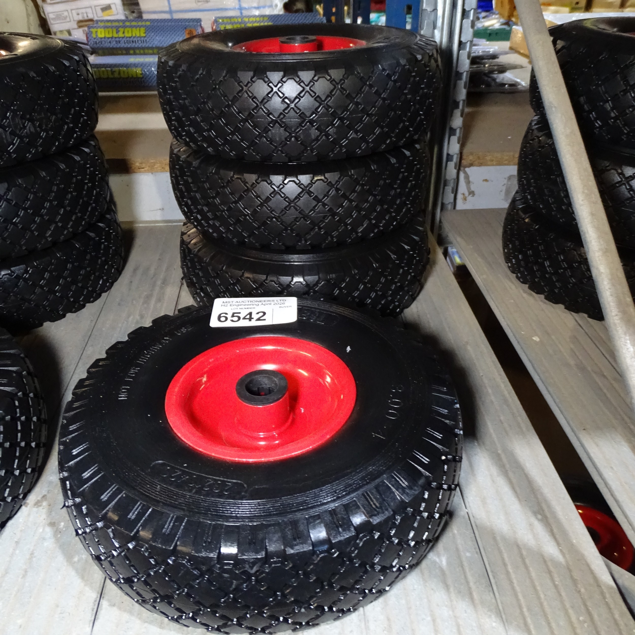 4 x small red metal wheels fitted with BIL 3.00-4 puncture resistant tyres