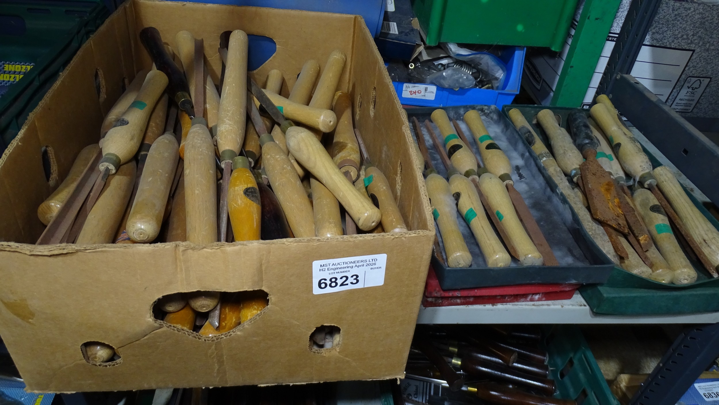 A quantity of various woodworking chisels and wood turning tools etc ...