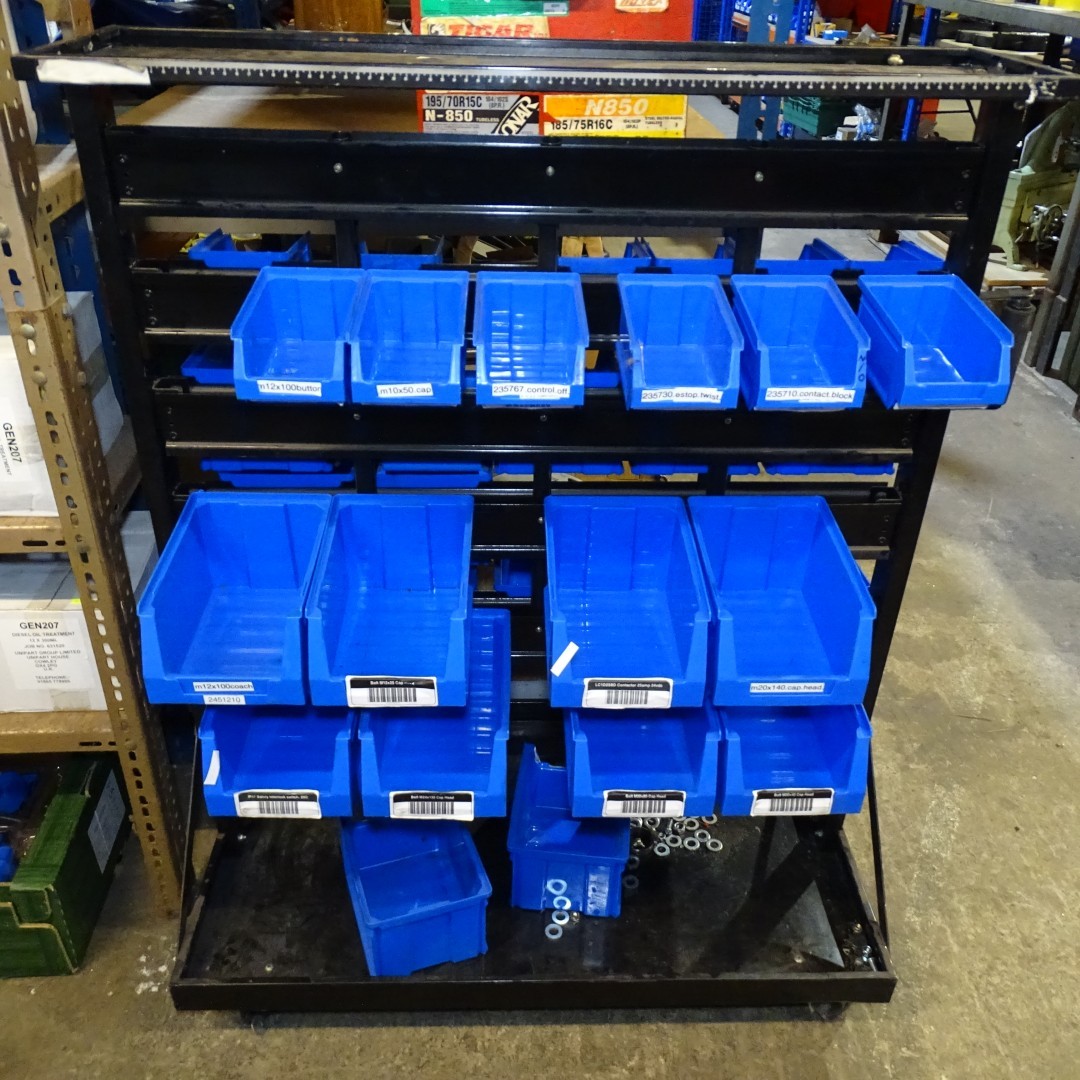 1 x Wheeled lin bin type storage rack with a quantity of various blue ...