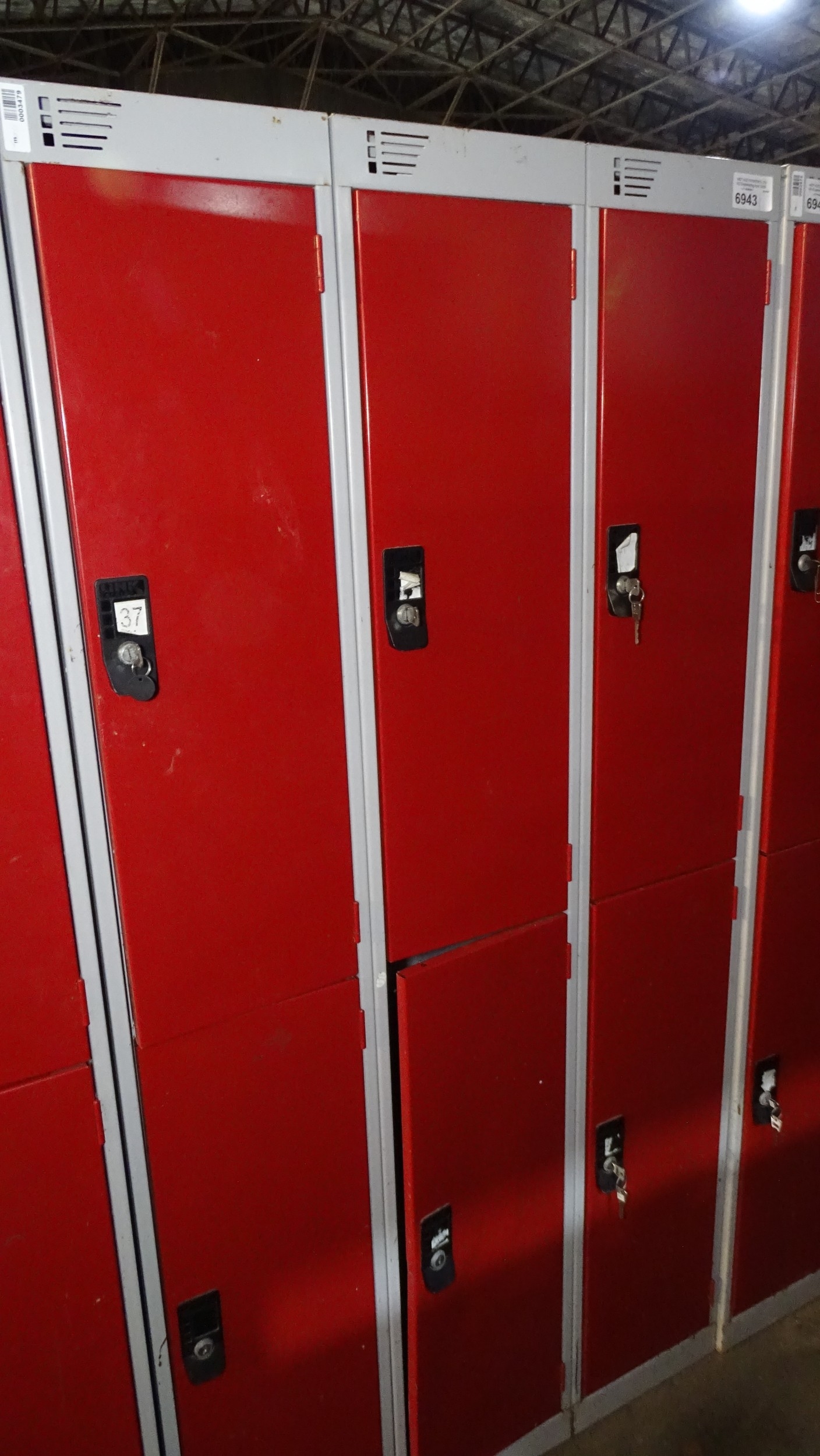 1 x Red and grey metal 6 door storage locker (Please note some locks do ...