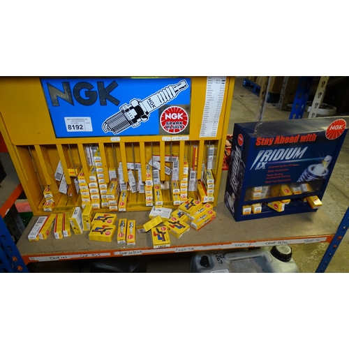 A quantity of various NGK Spark plugs and 2 x NGK Display / Storage ...