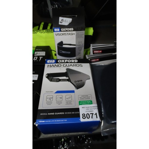 8071 - A quantity of various items to include Moto GP Hats, Goggles and a pair of hand guards etc - Content... 