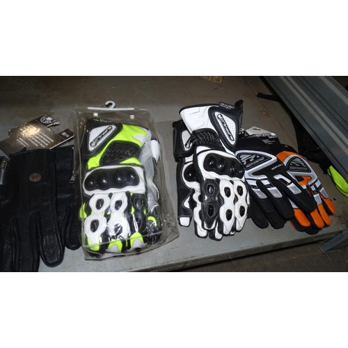 8073 - A quantity of various motorcycle gloves - Contents of 1 shelf