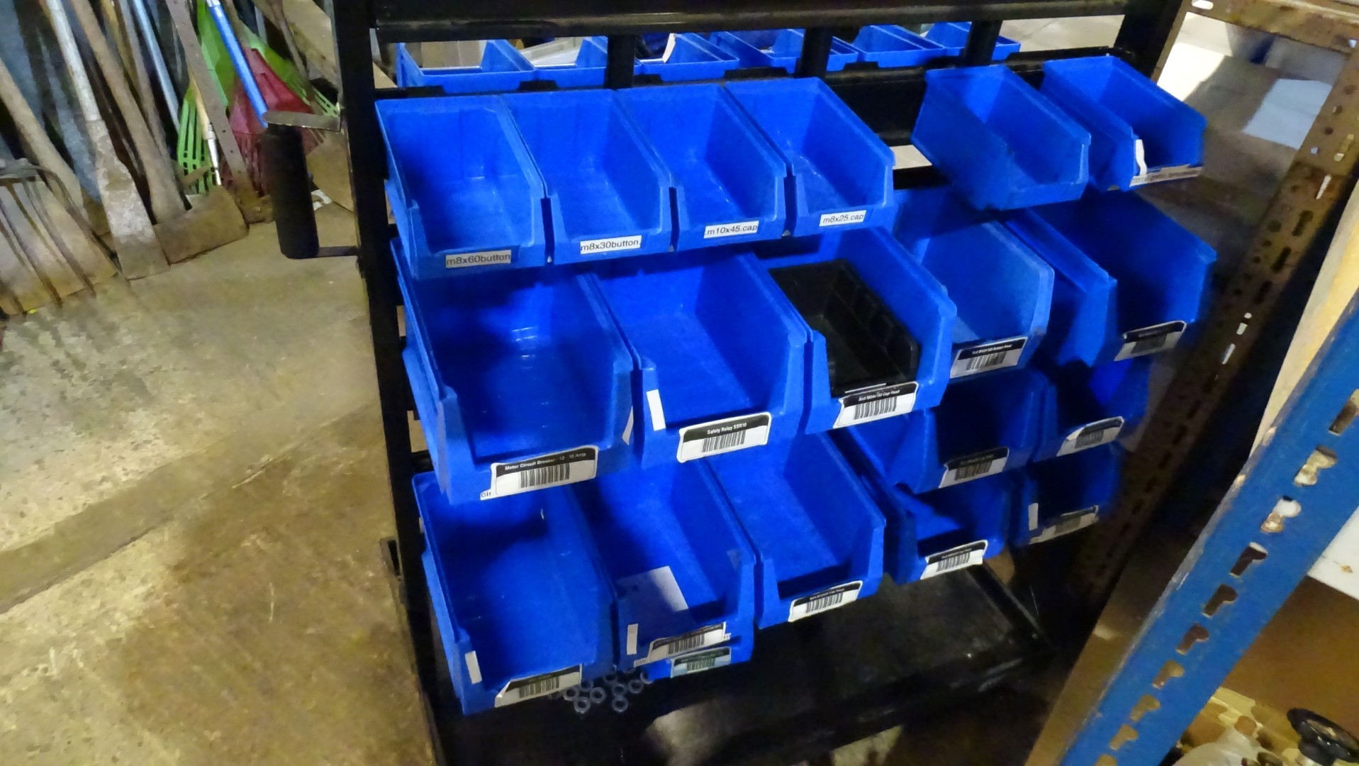 1 x Wheeled lin bin type storage rack with a quantity of various blue ...