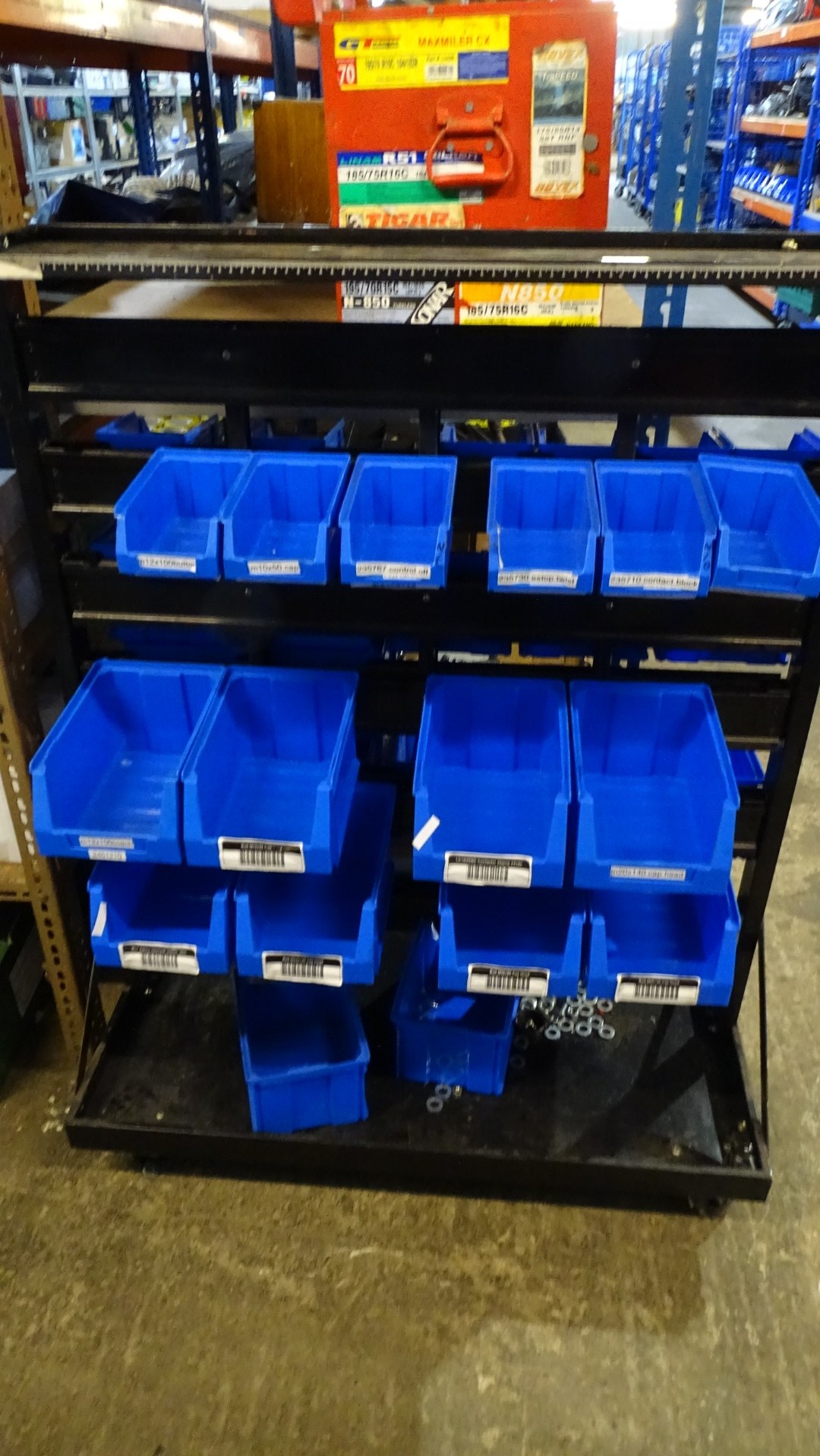 1 x Wheeled lin bin type storage rack with a quantity of various blue ...