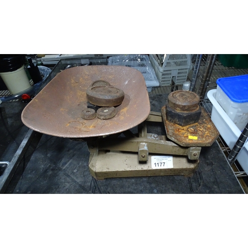 1177 - VAT. A vintage set of weighing scales with various weights