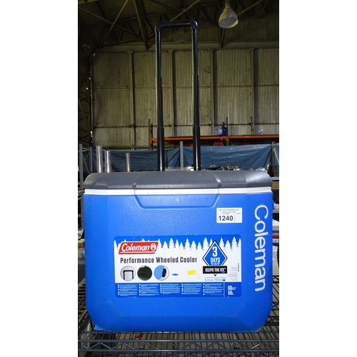 1240 - A large mobile 56lt cool box by Coleman with extendable handle