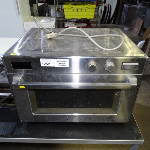 1252 - VAT. A commercial stainless steel microwave oven by Panasonic type NE-1540 TradeTested Working... 