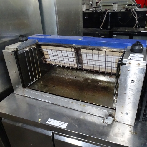 1276 - VAT. A gas fired steak house grill by blueseal missing stand and grill pan trade... 