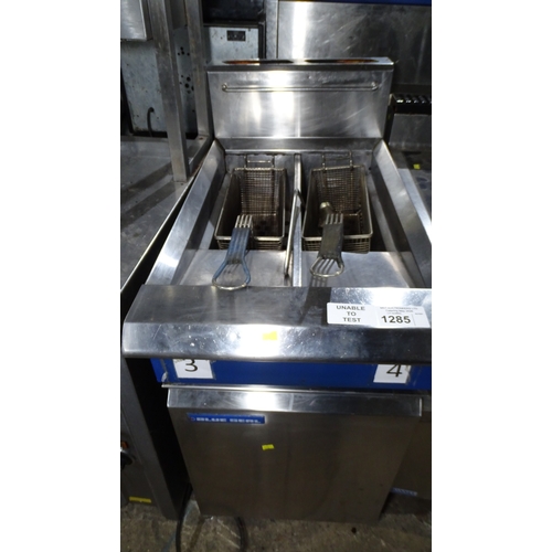 1285 - VAT. A commercial stainless steel double basket deep fryer by Blue Seal gas trade... 