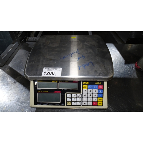 1286 - VAT. A set of electric scales by UWE type OAP-6 no power adapter trade