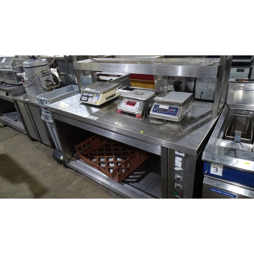 1288 - VAT. A commercial stainless steel heated cabinet, no doors, gantry above approx 150*70*160cm trade... 