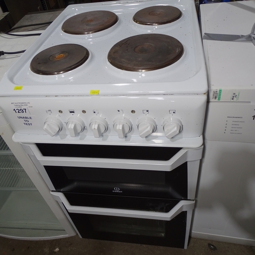 1297 - An electric oven by Indesit - 4 ring hob with grill and oven below Trade