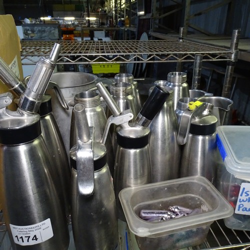 1174 - A quantity of co2 powered cream dispensers by ISI , jugs, mosa pro capsules etc, contents of 1/2 a S... 