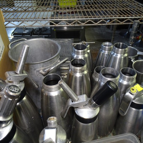 1174 - A quantity of co2 powered cream dispensers by ISI , jugs, mosa pro capsules etc, contents of 1/2 a S... 