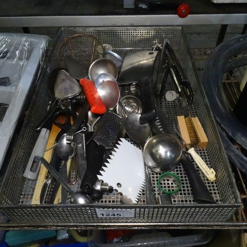 1245 - A quantity of various catering related items including cutlery, utensils, rubber gloves etc, content... 