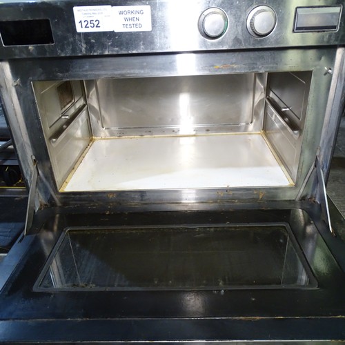 1252 - VAT. A commercial stainless steel microwave oven by Panasonic type NE-1540 TradeTested Working... 