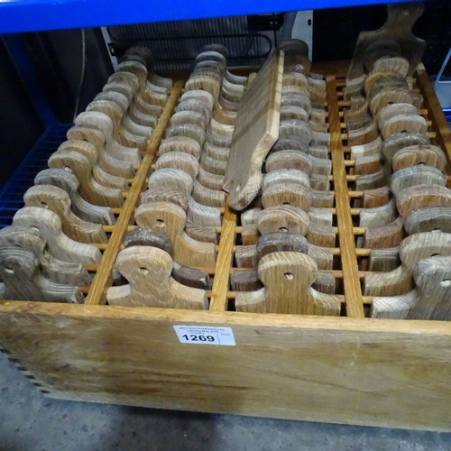 1269 - A box containing 64 wooden paddle serving boards