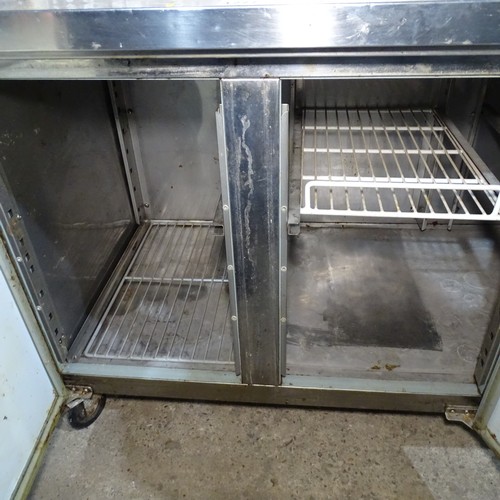 1277 - VAT. A commercial stainless steel mobile 3 door bench fridge prep table approx 180*70*84 trade - una... 
