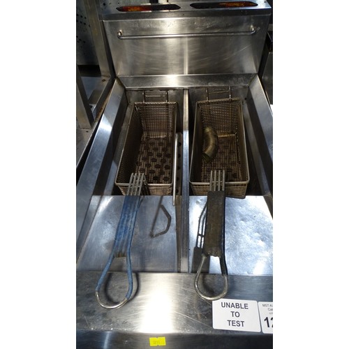 1285 - VAT. A commercial stainless steel double basket deep fryer by Blue Seal gas trade... 