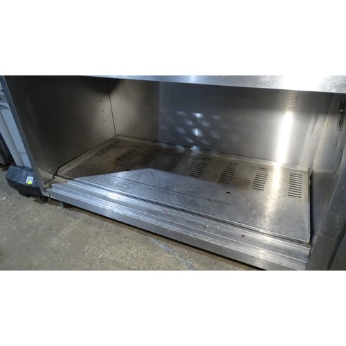 1288 - VAT. A commercial stainless steel heated cabinet, no doors, gantry above approx 150*70*160cm trade... 
