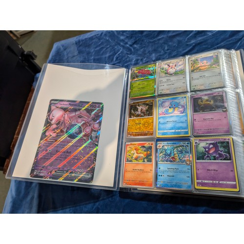 A massive collection of over 1000 Pokemon cards Inc foils, EX's & a jumbo  Mew Two EX in 2 x full