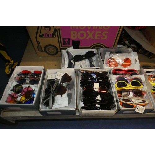 2153 - A quantity of various sunglasses - Contents of 1 shelf