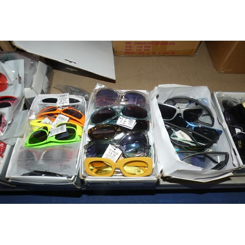 2153 - A quantity of various sunglasses - Contents of 1 shelf