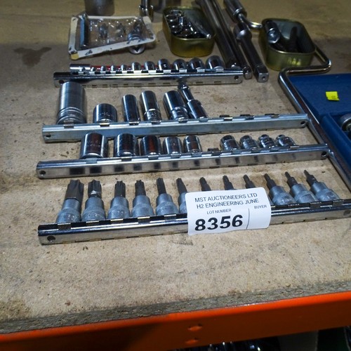 A quantity of various sockets and extension bars etc