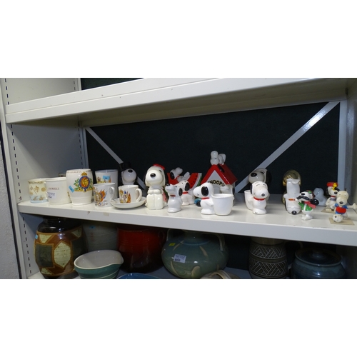 5054 - A quantity of royal commemorative beakers and a quantity of Snoopy ornaments (one shelf)... 
