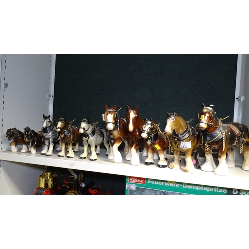 5058 - A collection of 10 miscellaneous ceramic cart horses