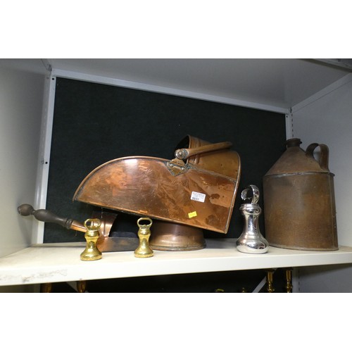 5031 - A large copper coal scuttle with shovel, various heavy weights, four pairs of brass candlesticks and... 