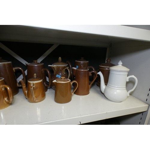 5049 - A quantity of miscellaneous brown pottery teapots, coffee pots, jugs and miscellaneous stoneware kit... 