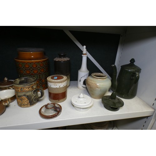 5049 - A quantity of miscellaneous brown pottery teapots, coffee pots, jugs and miscellaneous stoneware kit... 