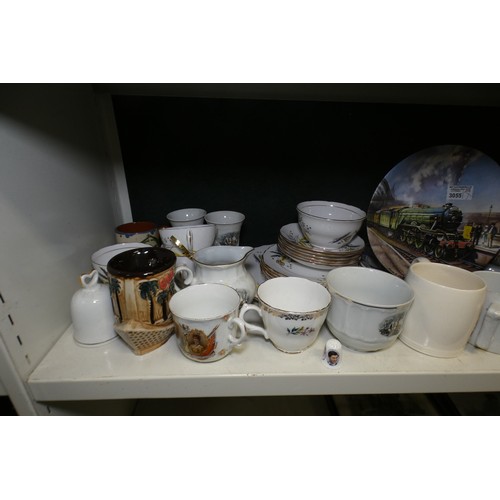 5050 - Two decorative wall plates and a quantity of miscellaneous decorative tea ware, beakers and the mini... 