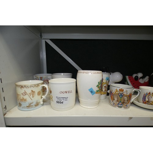 5054 - A quantity of royal commemorative beakers and a quantity of Snoopy ornaments (one shelf)... 