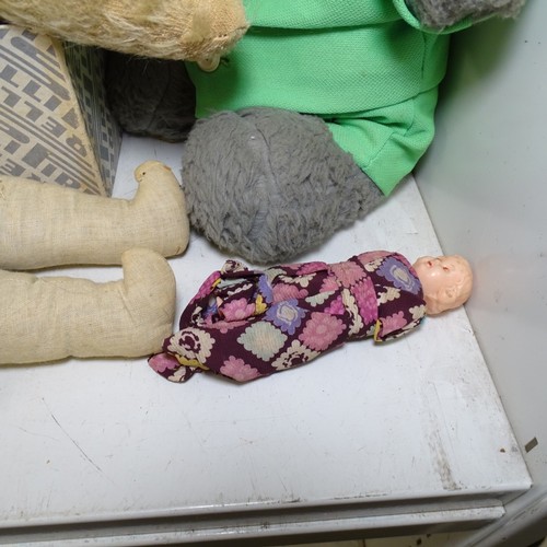 5021 - A quantity of miscellaneous vintage soft toys and a porcelain head doll. Note Cows head is damaged. ... 