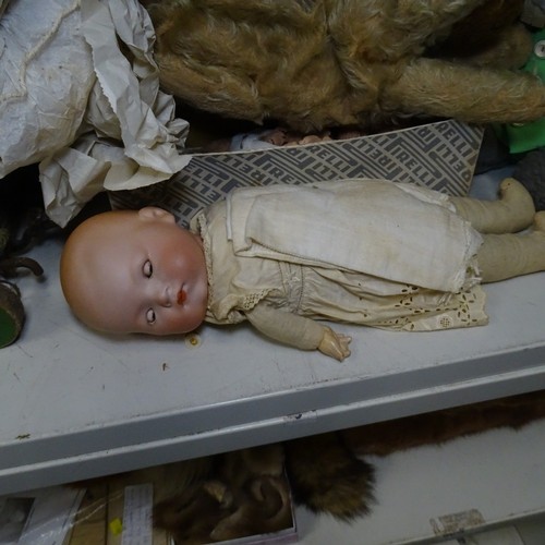 5021 - A quantity of miscellaneous vintage soft toys and a porcelain head doll. Note Cows head is damaged. ... 