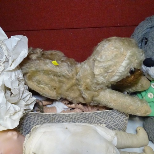 5021 - A quantity of miscellaneous vintage soft toys and a porcelain head doll. Note Cows head is damaged. ... 