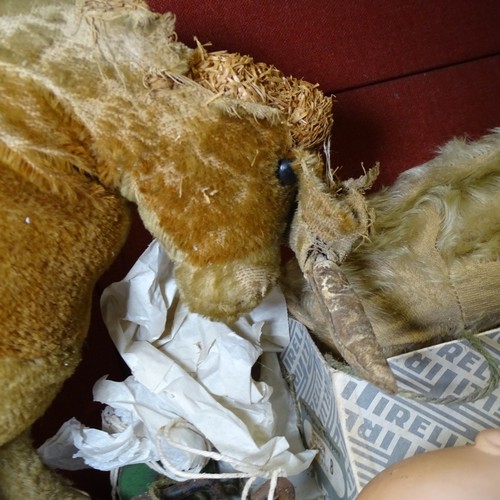 5021 - A quantity of miscellaneous vintage soft toys and a porcelain head doll. Note Cows head is damaged. ... 